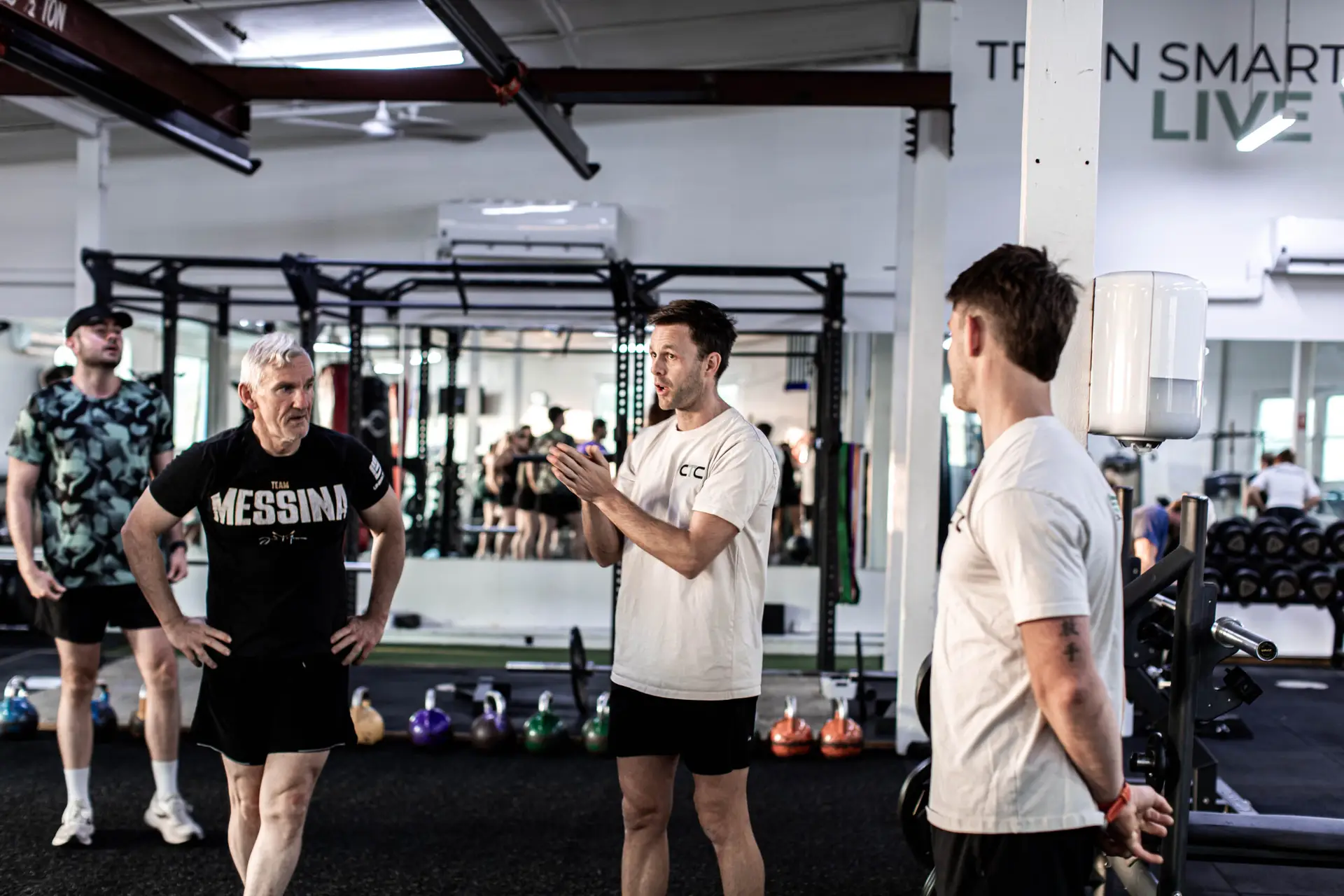 JJ Coutts coaching on the gym floor