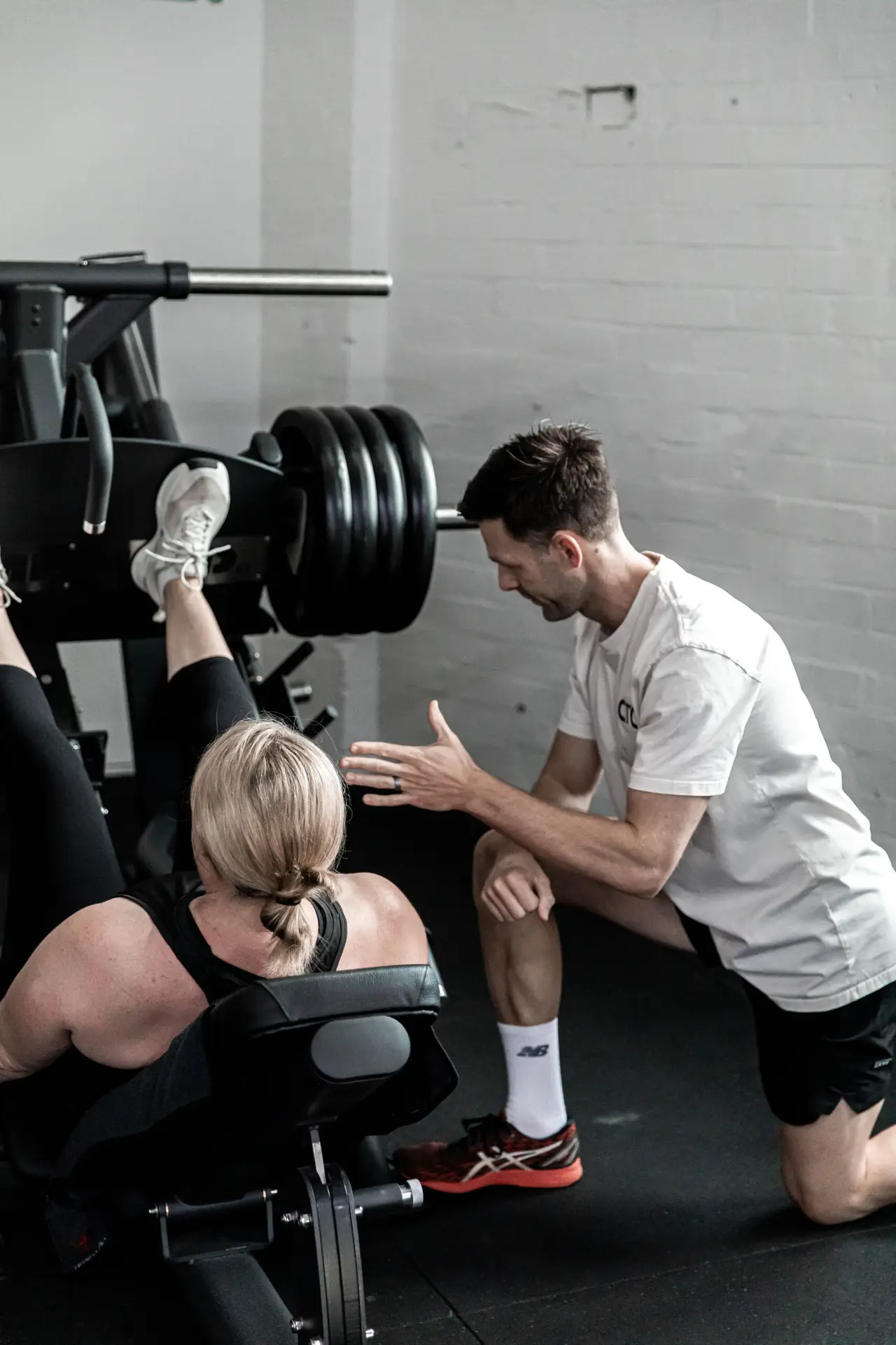 Catalyst coaching team working with a member