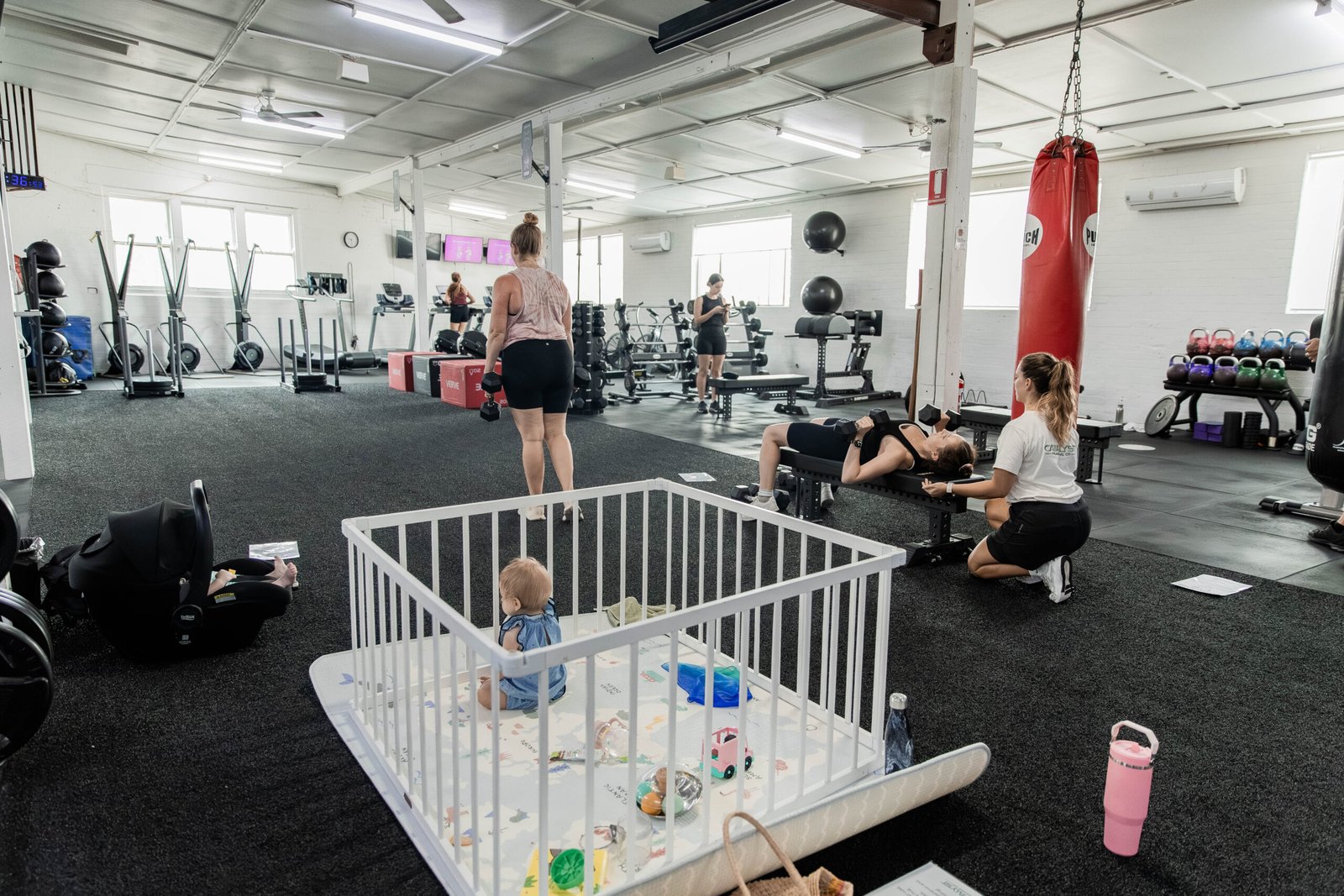 Pregnant woman doing safe pre-natal exercise at Catalyst Training Co gym in Sydney Eastern Suburbs